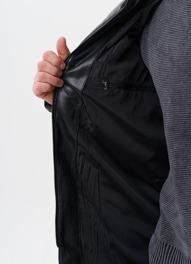 Пуховик из эко кожи с капюшоном из меха енота модель № 28584 универмаг малина